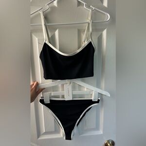 Lspace bathing suit. Size medium top & bottom. Never worn w/ tags!